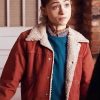 Nancy Wheeler Wearing blue top and Red Jacket in Stranger Things