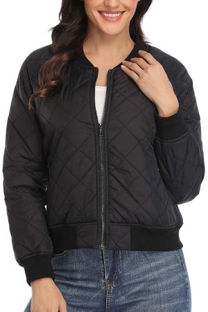 A Young Girl Wearing A Black Color Quilted Design Jacket