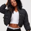 Young Women Wearing Black Cropped Puffer Jacket