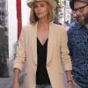 Charlize Theron Wear A Light Brown Blazer In Long Shot