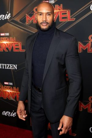 Henry Simmons Wearing Black Suit at an event for Captain Marvel Movie
