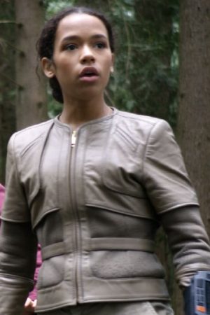 Taylor Russell Wearing Gray Jacket In Lost in Space