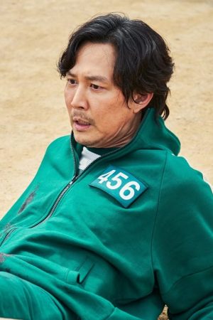 Lee Jung-jae in Squid Game (2021) he wear green 456 tracksuit