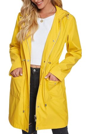A Yung Women Wearing Yellow Waterproof Hooded Raincoat